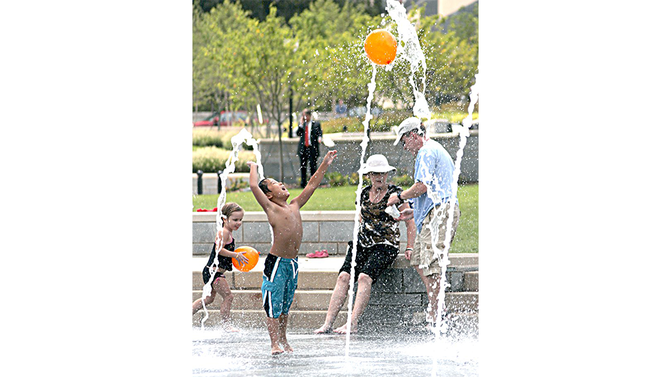 pack square park asheville - splash park boy balloon